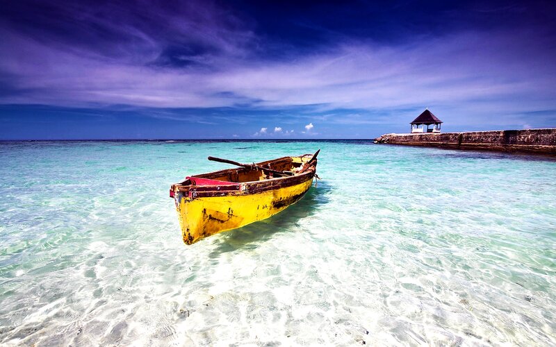 Yellow Boat in Shallow Water