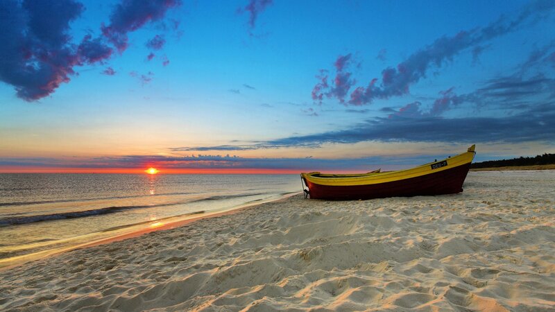 Yellow Boat on Beach — Blue, Serene, Sunset, Photograph, Ocean, Sand, Orange