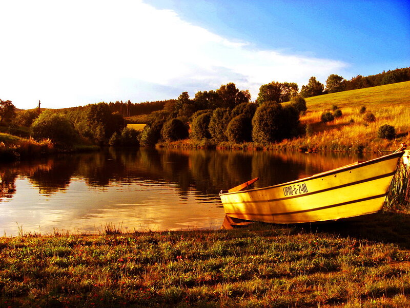 Yellow Boat on Shore