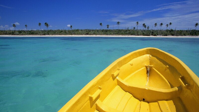 Yellow boat on turquoise water