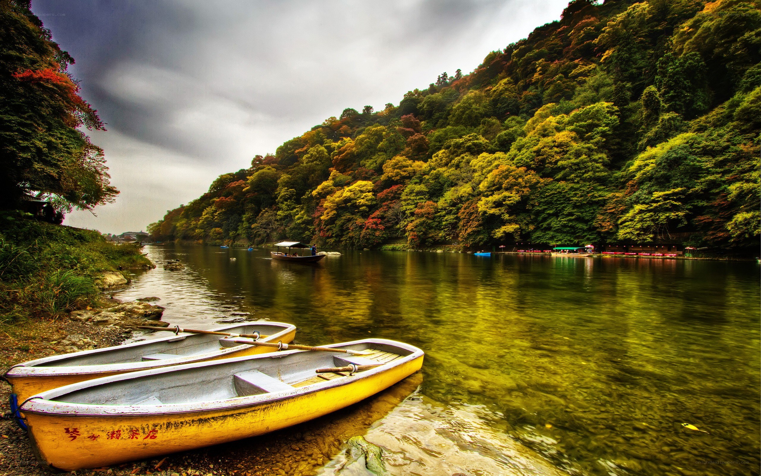 Yellow boats on a river