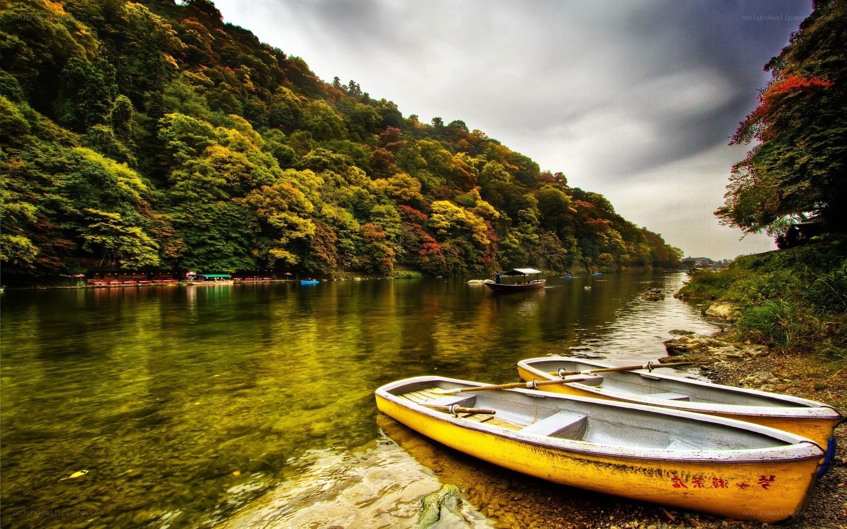 Yellow boats on a river