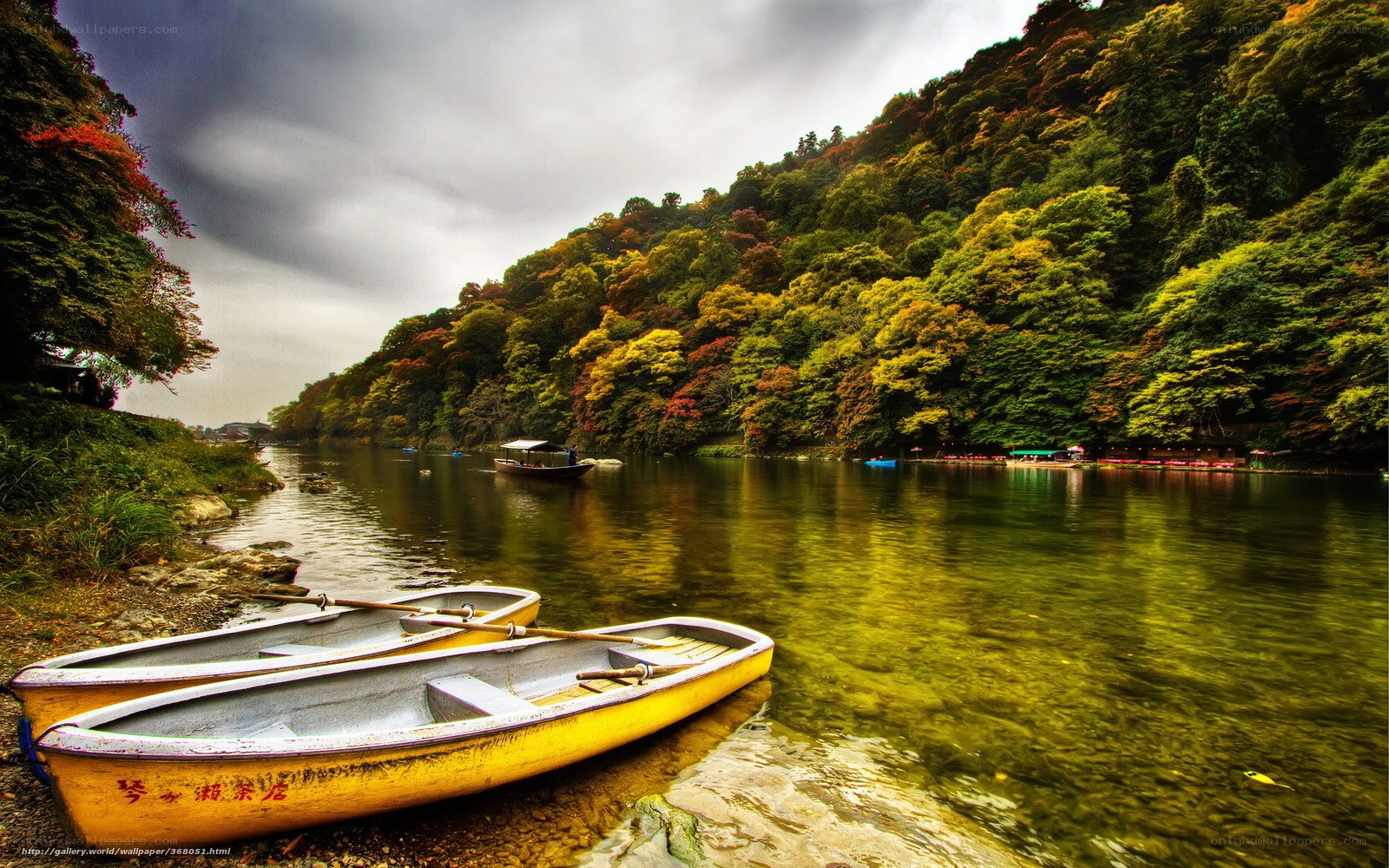 Yellow boats on a river