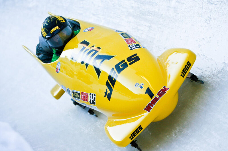 Yellow bobsled in action