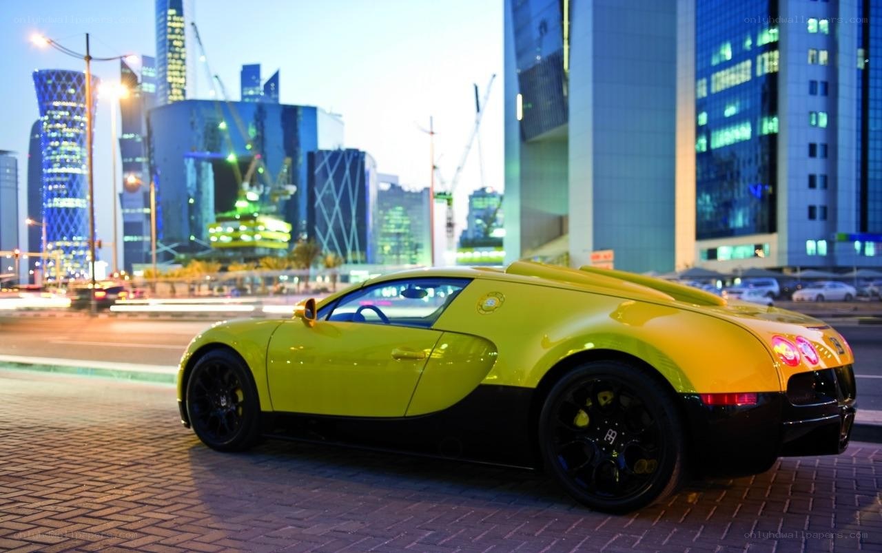 yellow bugatti in city