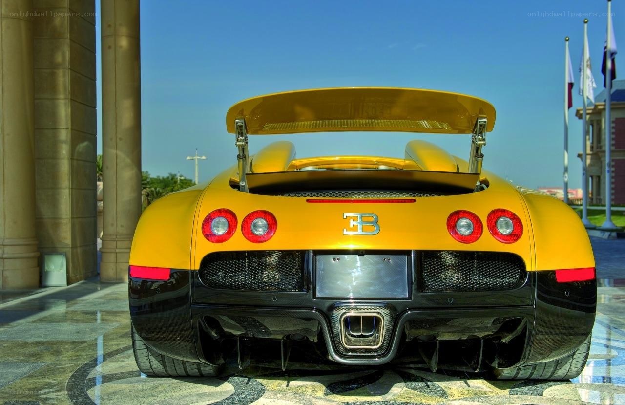 yellow bugatti veyron rear view