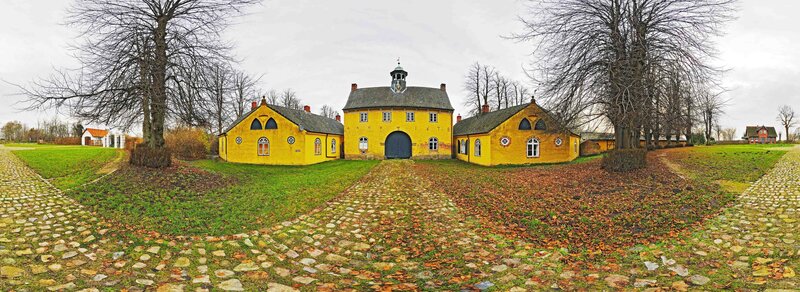 Yellow buildings at a historic estate