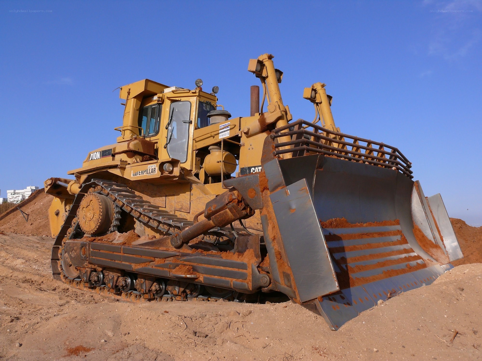 Yellow bulldozer on construction site