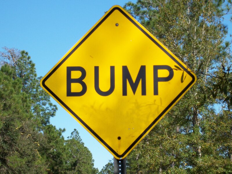 yellow bump sign
