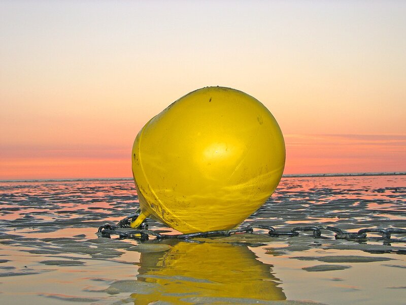 Yellow Buoy on Beach