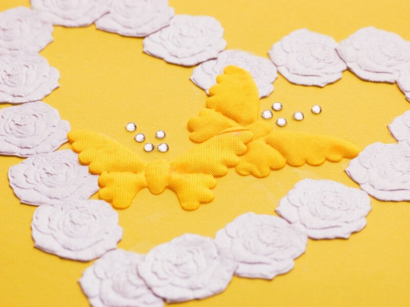 yellow butterfly with white flowers