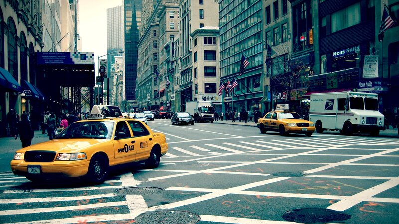 Yellow cabs on a busy city street