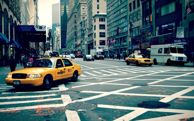 Yellow cabs on a busy city street