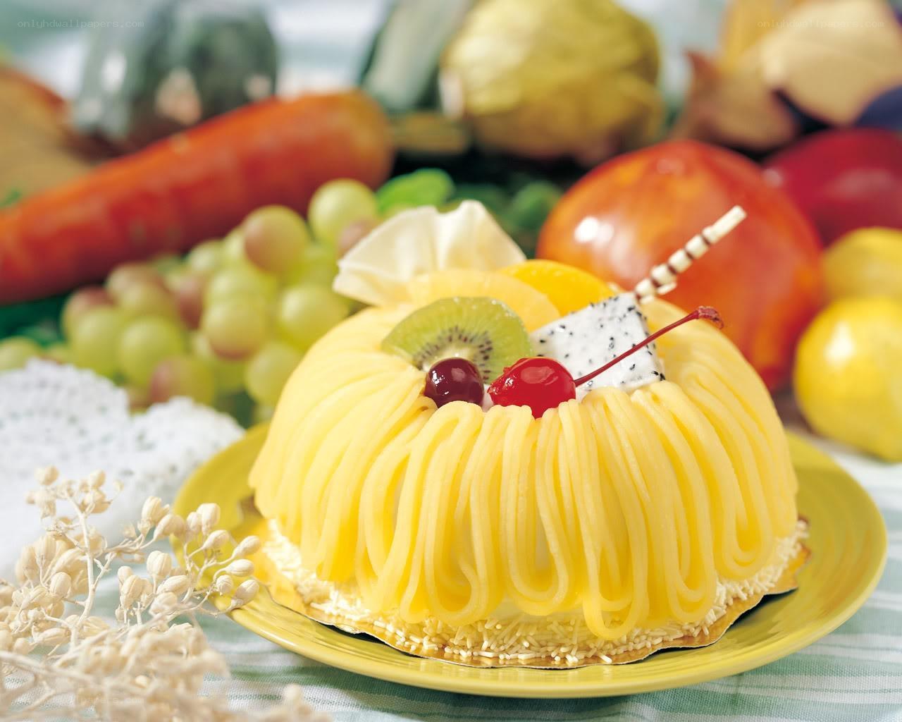 Yellow cake with fruit garnish