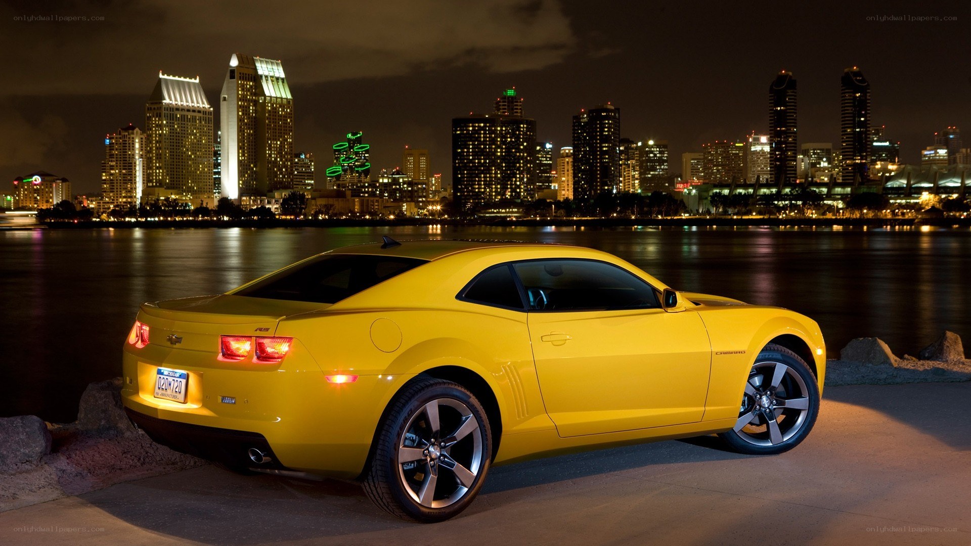 Yellow Camaro at night