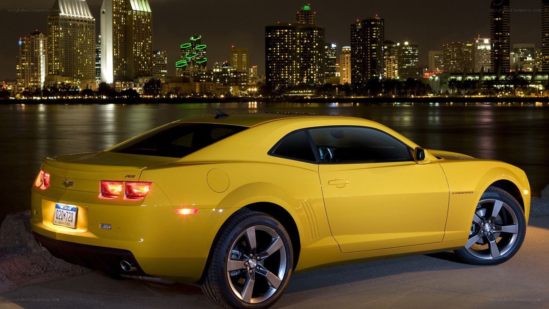 Yellow Camaro at night