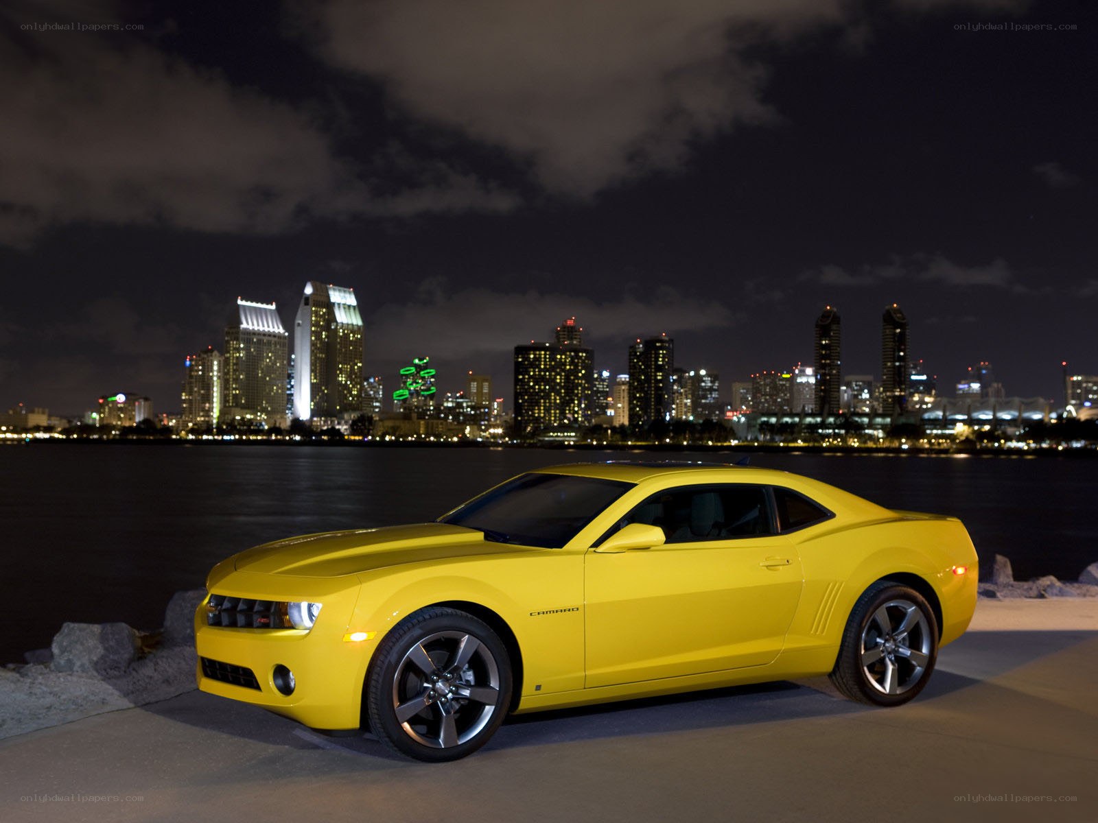 Yellow Camaro at night