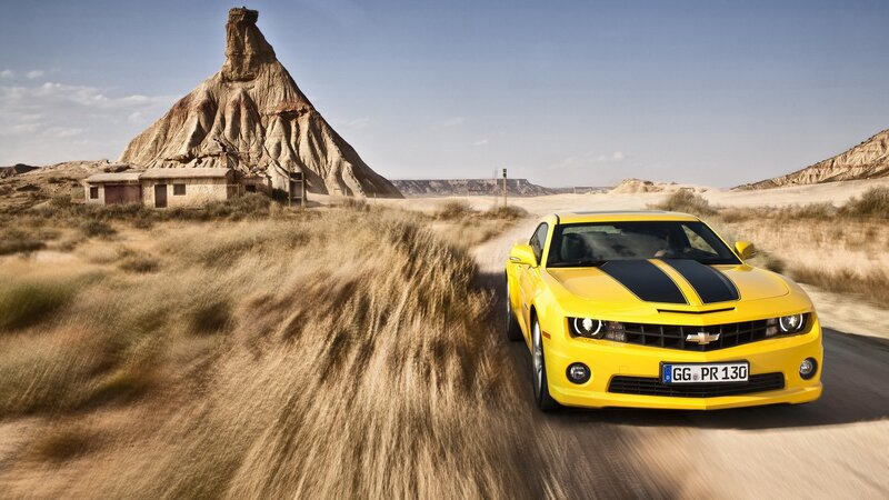 Yellow Camaro Car — Dramatic, Afternoon, Photograph, Desert, Rock Formation, Building