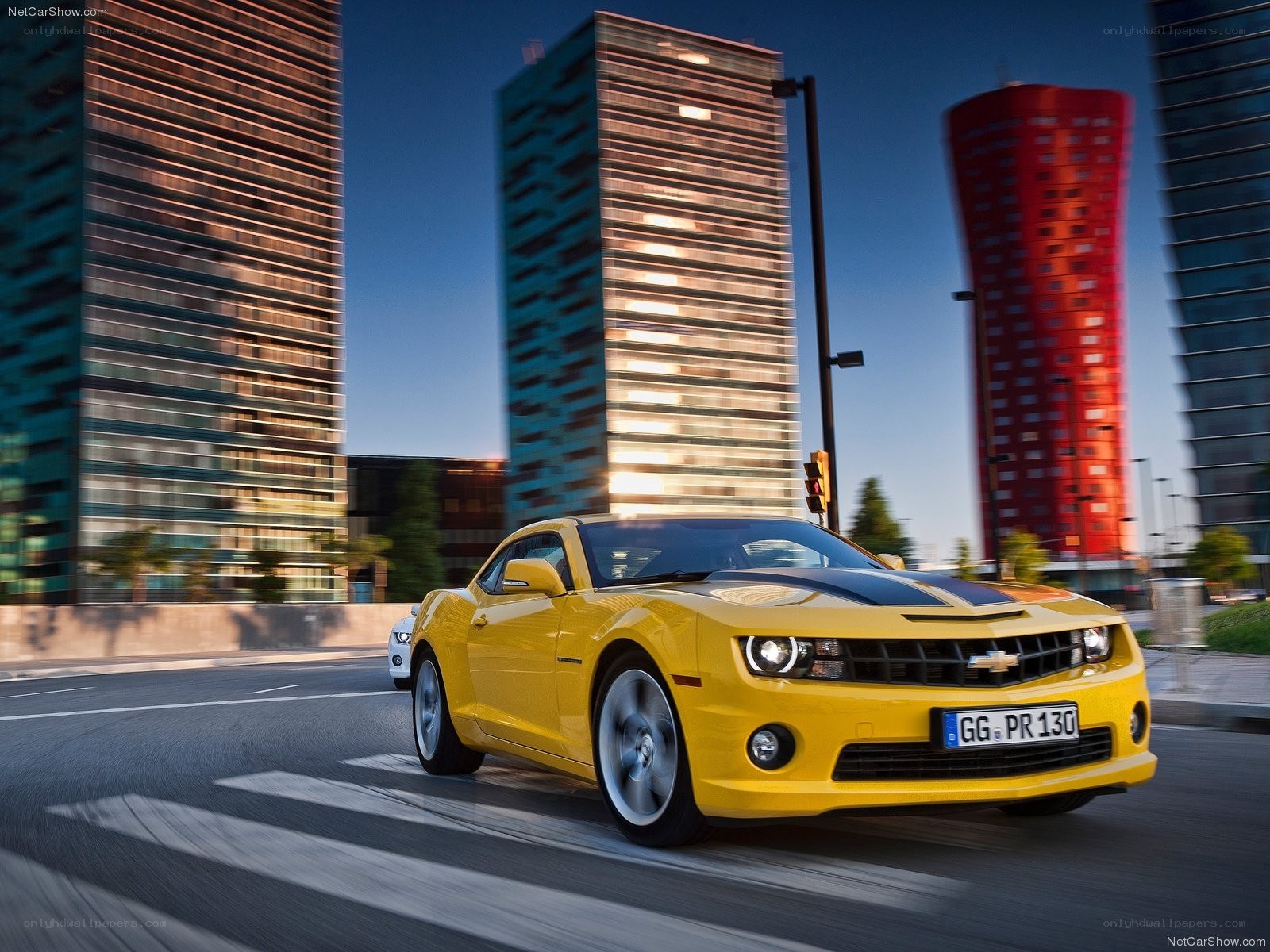 Yellow Camaro in city