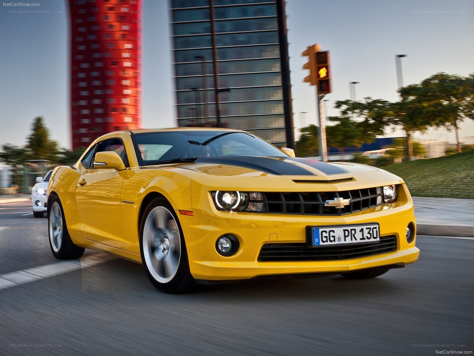 Yellow Camaro in city