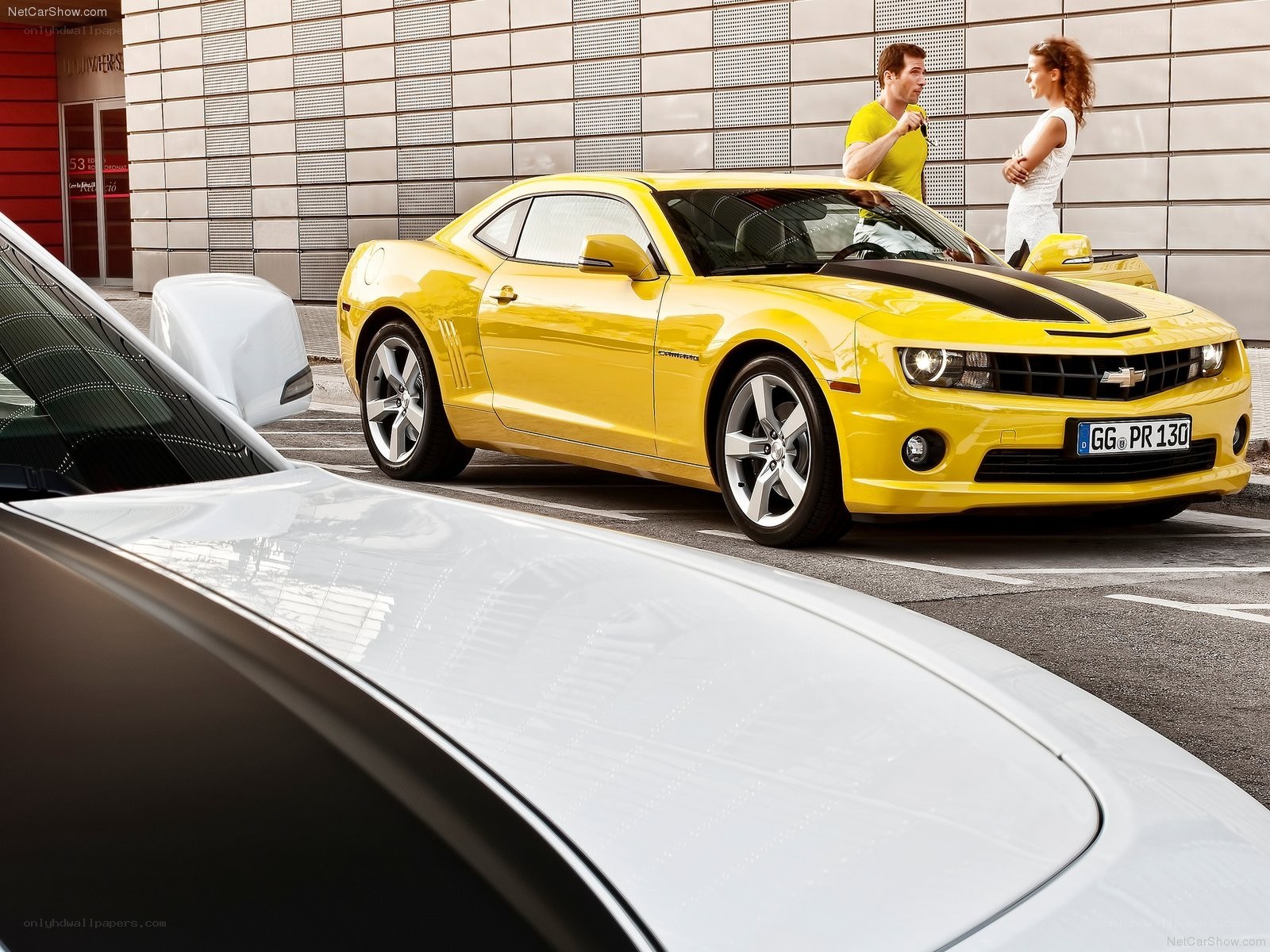 Yellow Camaro in city