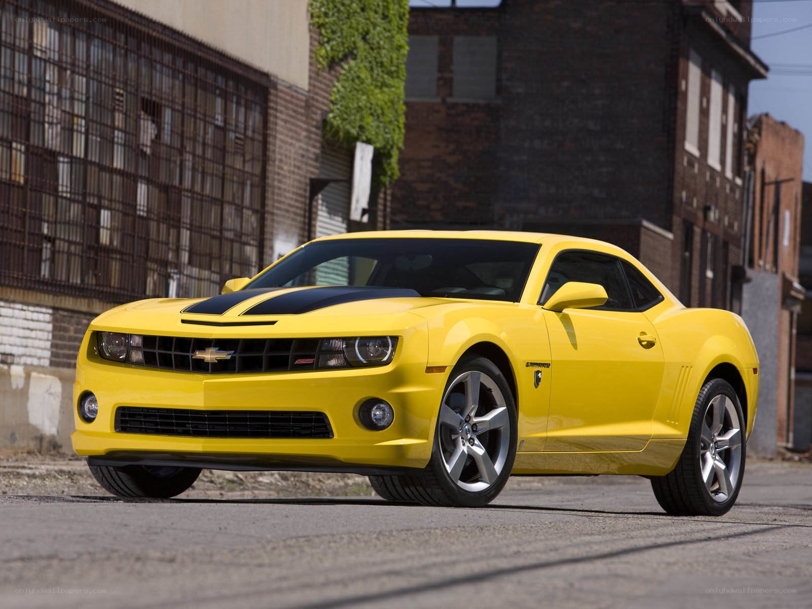 Yellow Camaro in urban setting