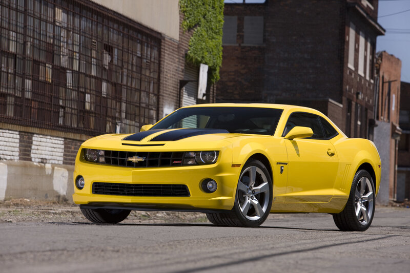 Yellow Camaro in urban setting