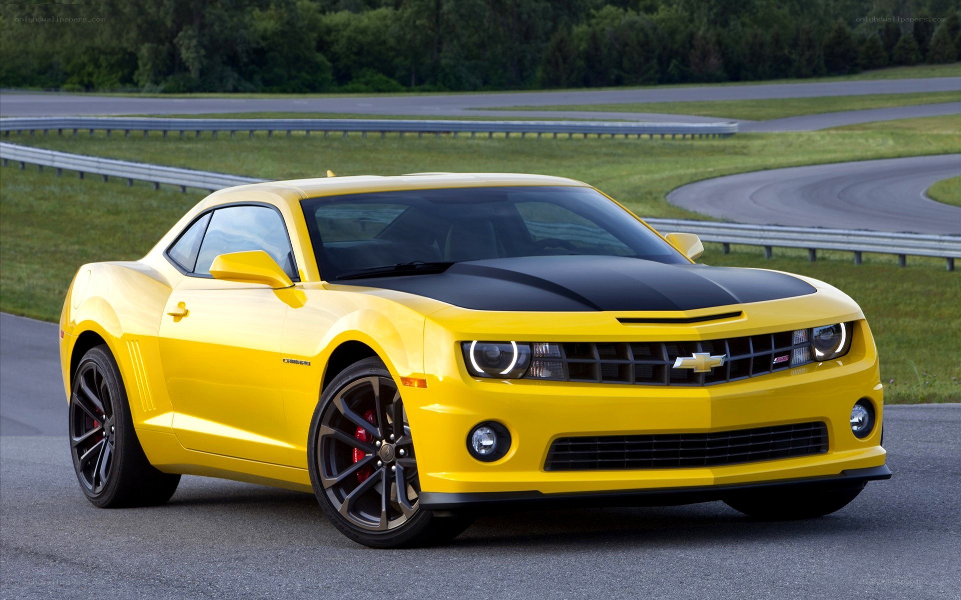 Yellow Camaro on a racetrack