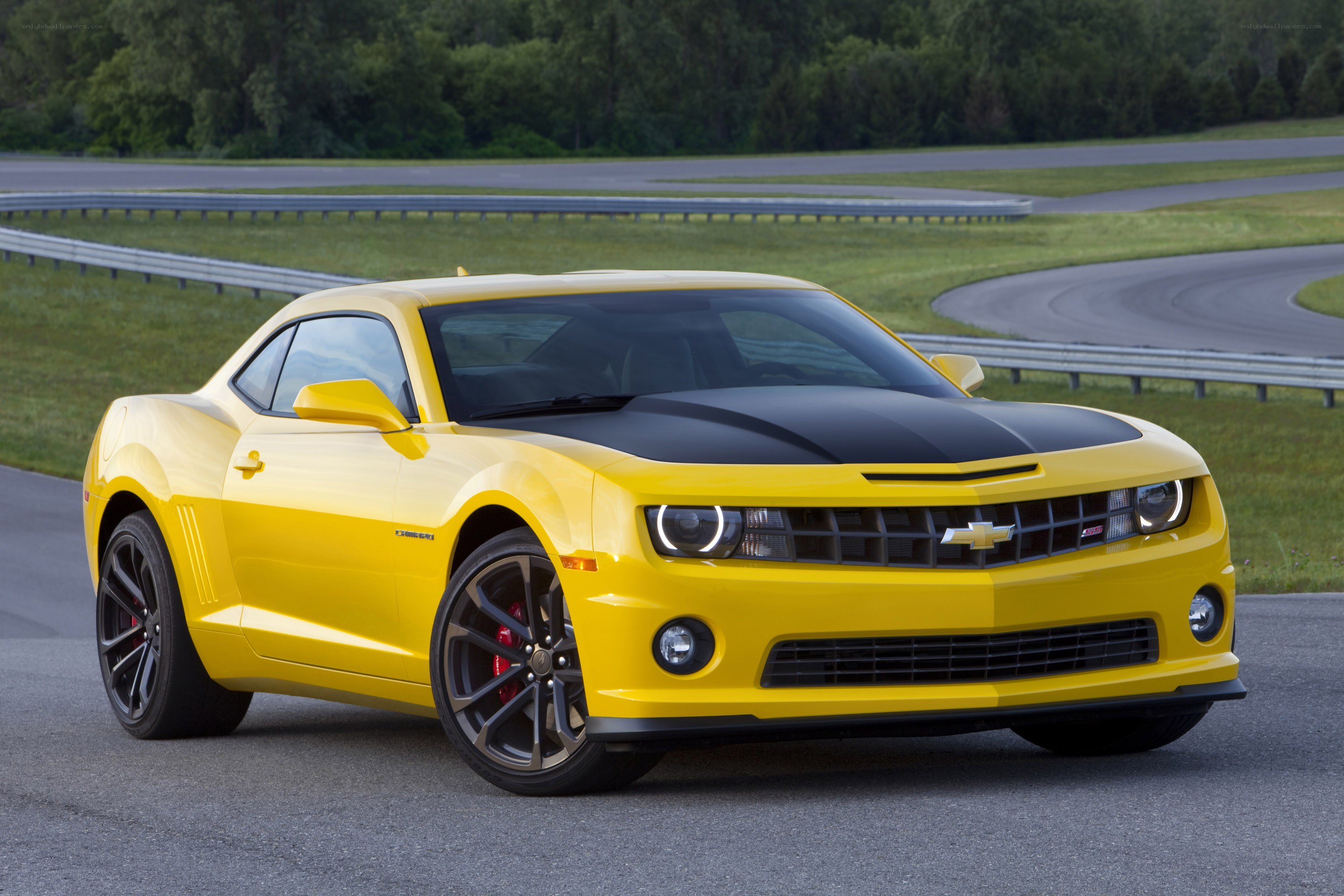 Yellow Camaro on a racetrack