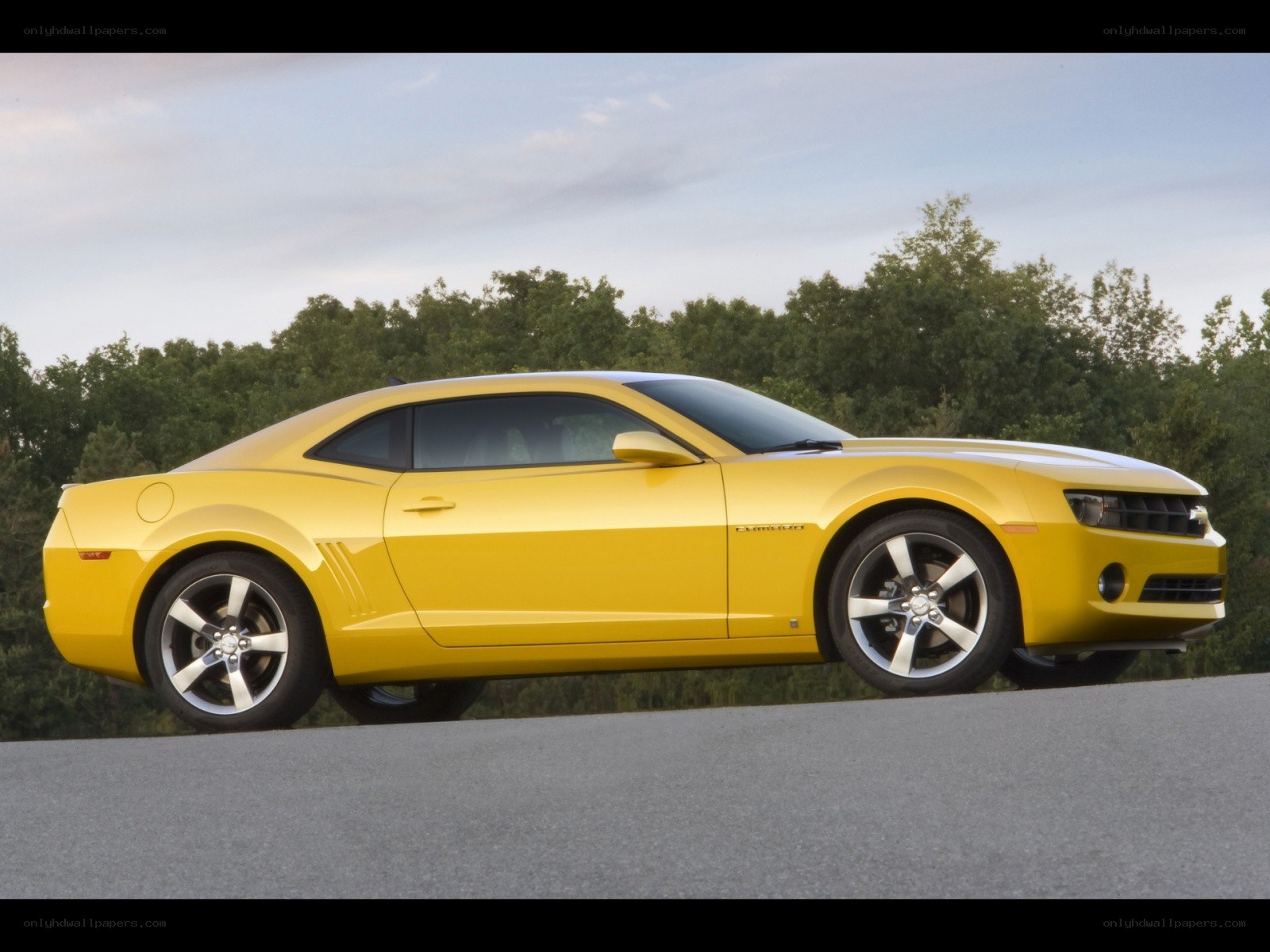 Yellow Camaro on a road