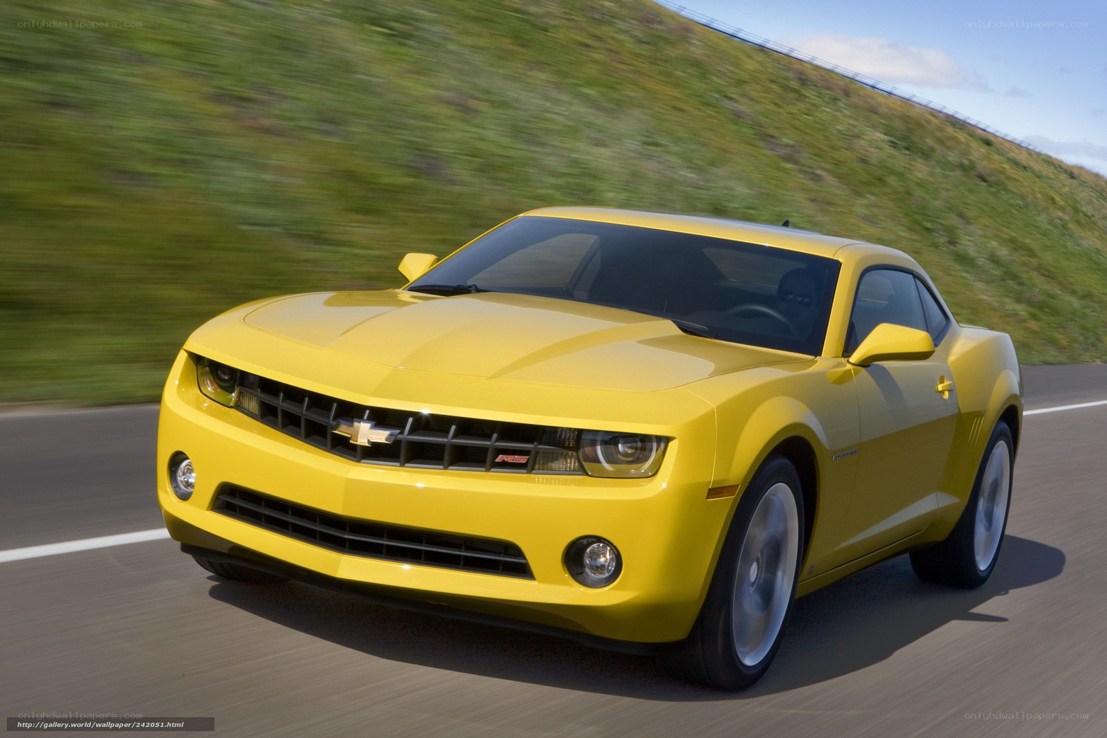 Yellow Camaro on a road