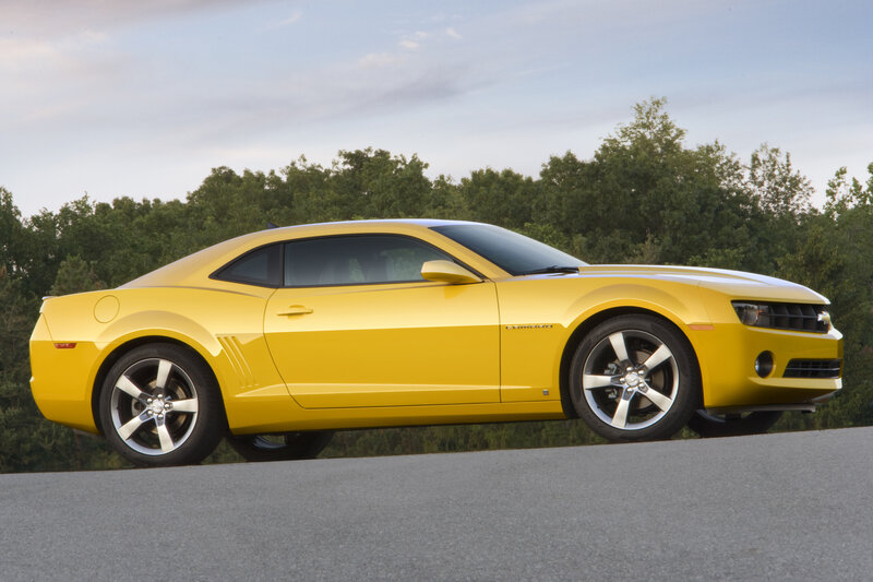 Yellow Camaro on road