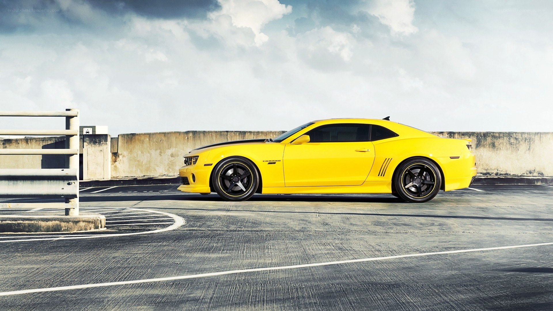 yellow camaro on rooftop