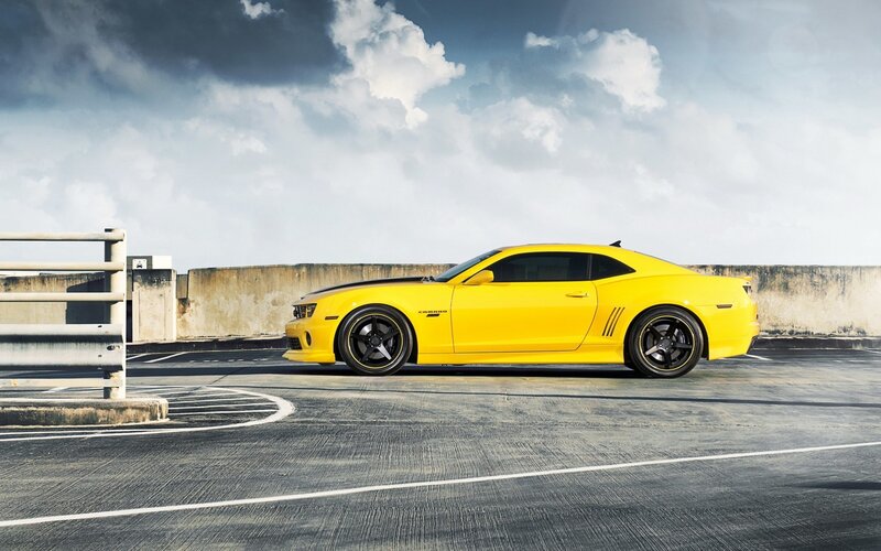 yellow camaro on rooftop