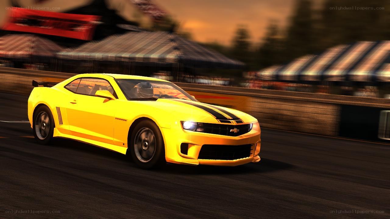 yellow camaro racing on track