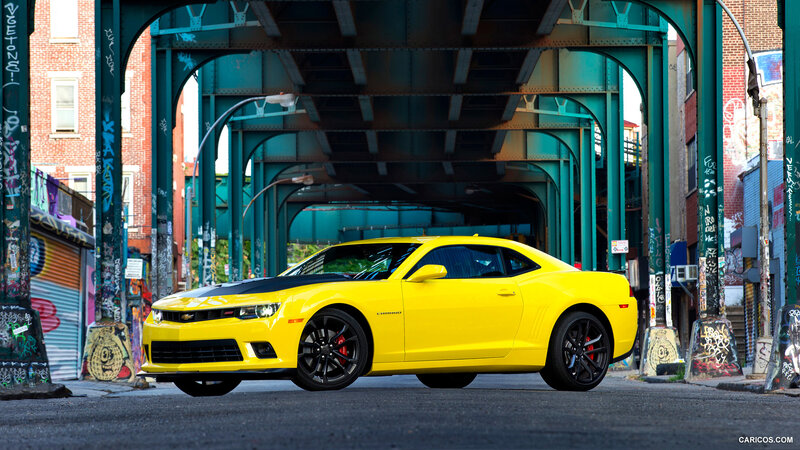 Yellow Camaro under Bridge