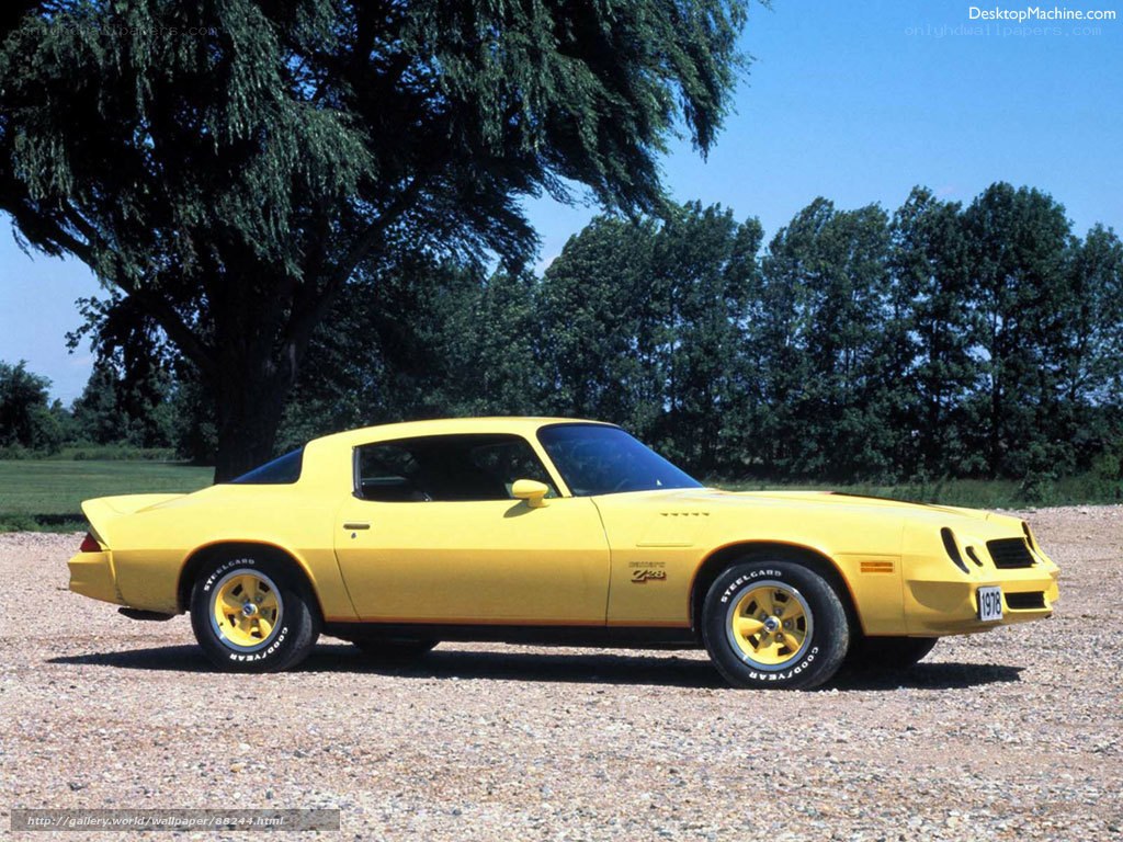 yellow camaro z28 classic car