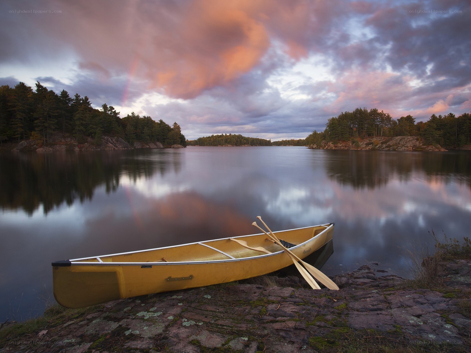 Yellow canoe at sunset