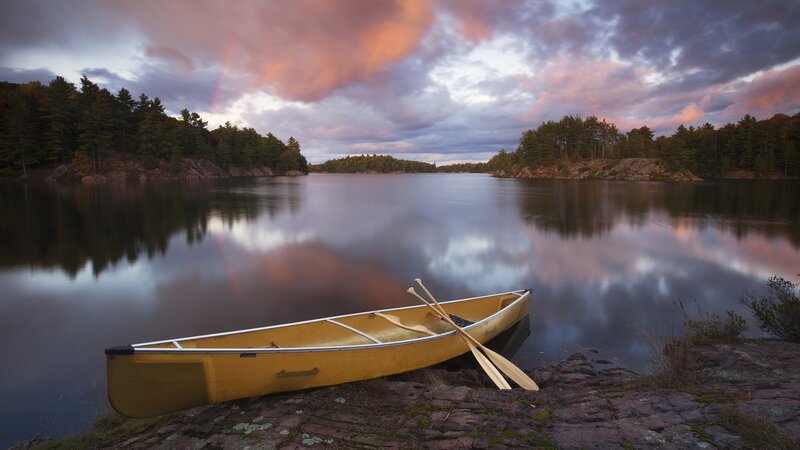 Yellow canoe at sunset