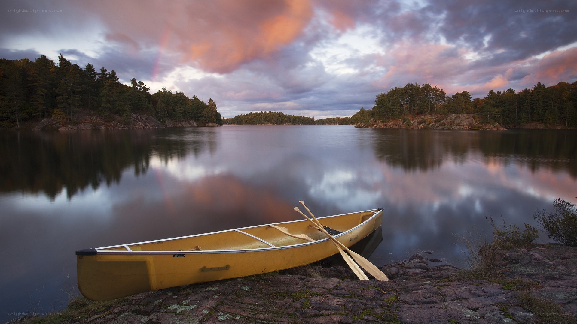 Yellow canoe at sunset