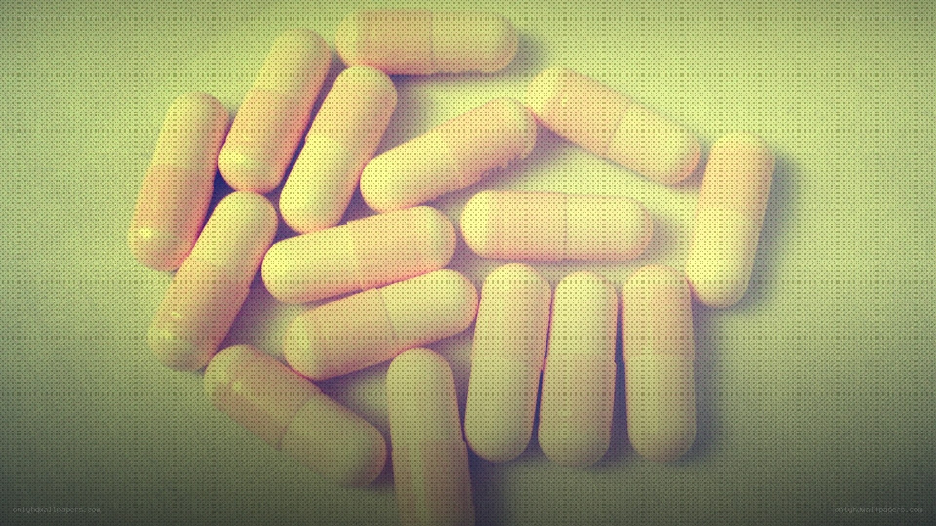 yellow capsules on surface