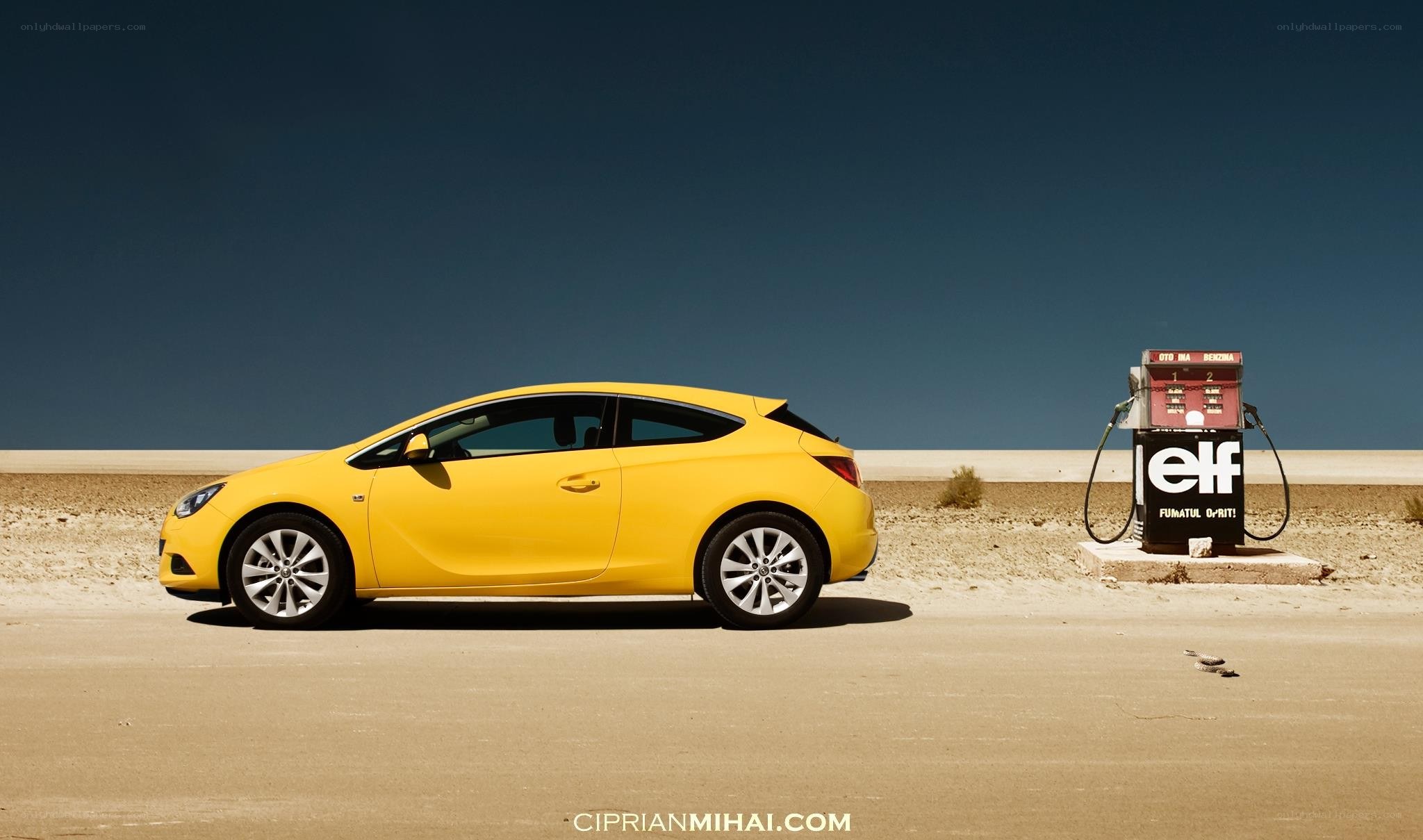 Yellow car at gas station