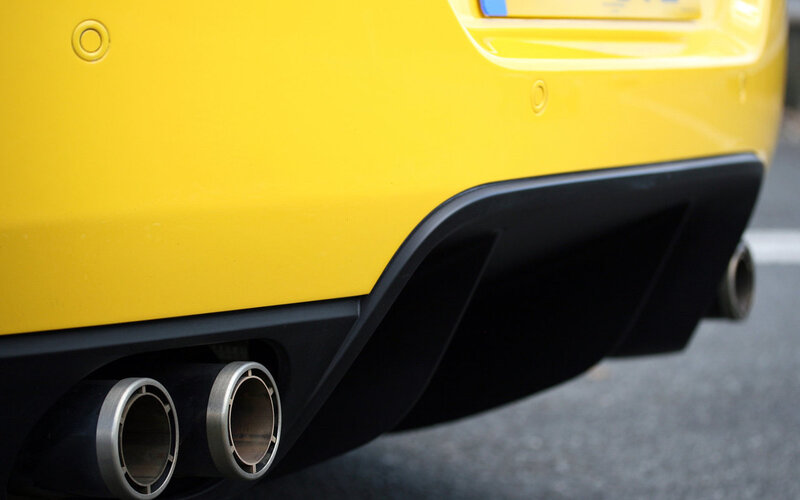 yellow car exhaust