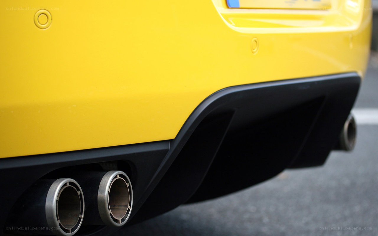 yellow car exhaust