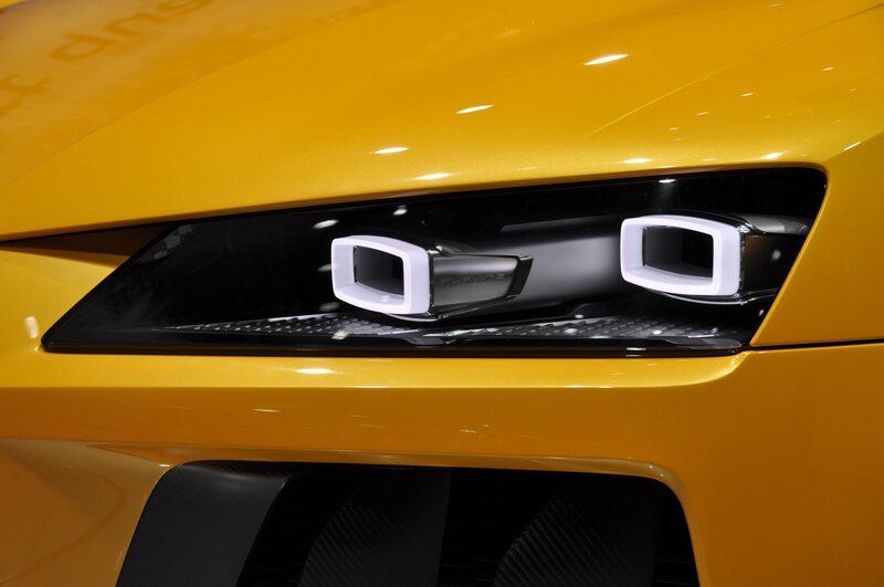 Yellow Car Headlight — Dramatic