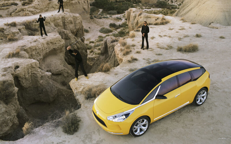 Yellow car in desert landscape