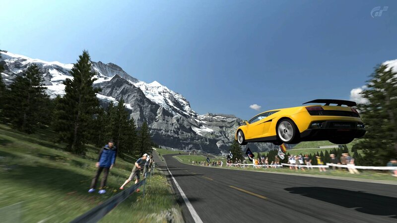 Yellow car in mid-air jump