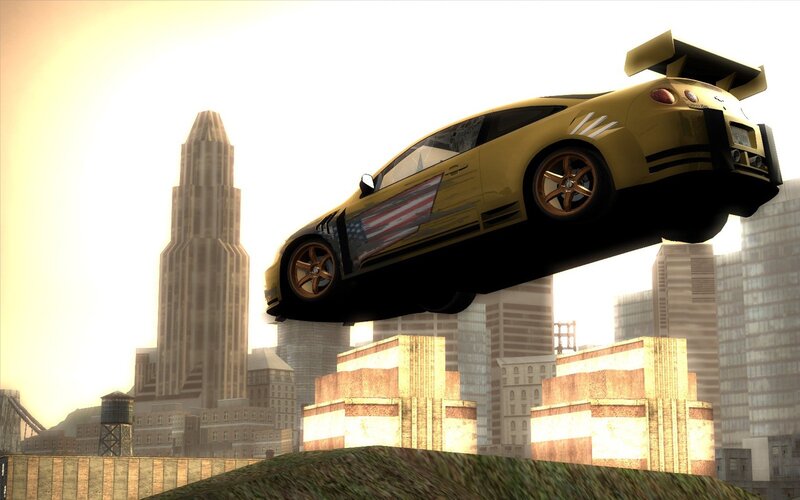 yellow car in mid-air jump