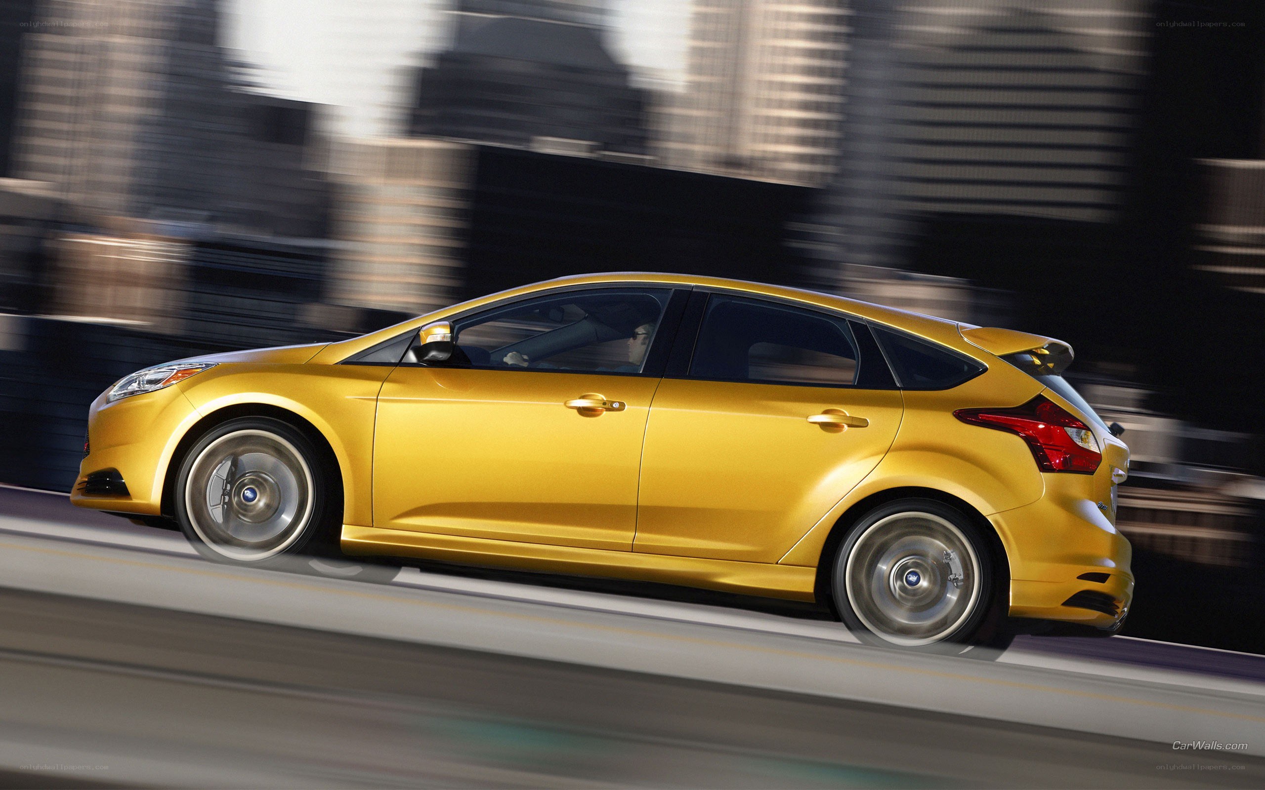 yellow car in motion