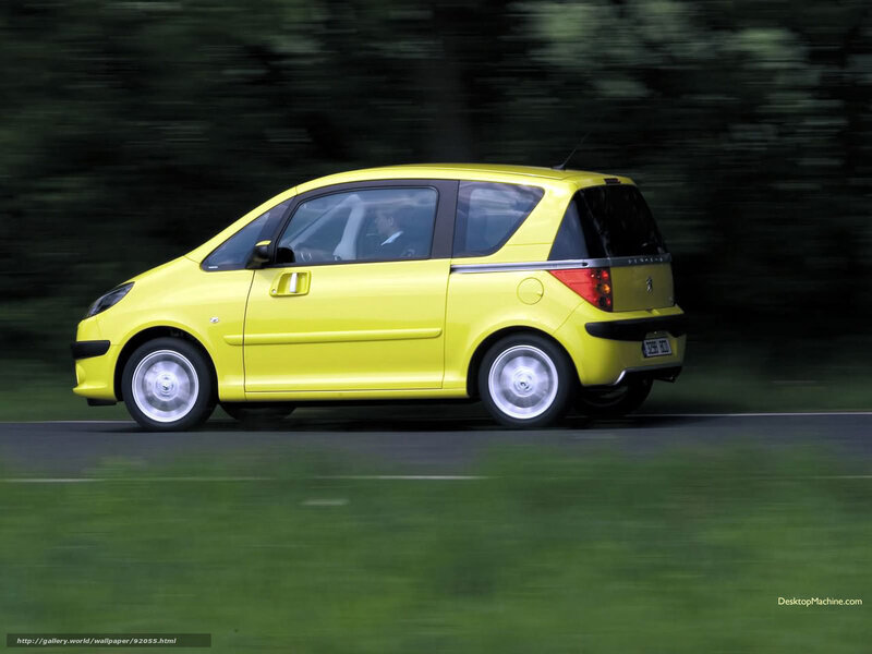 yellow car in motion